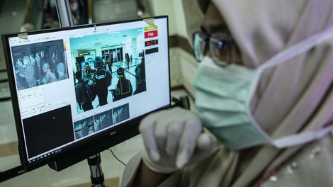 Na Kitajskem z novimi ukrepi za zajezitev širjenja virusa