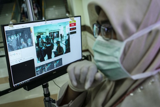 Na Kitajskem z novimi ukrepi za zajezitev širjenja virusa