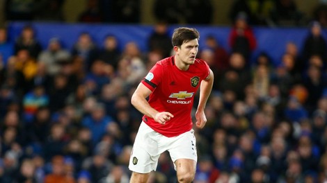 Branilec Manchester Uniteda v rojstnem kraju deli pakete s hrano starejšim