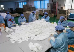 Kitajski inšpektorji so se spravili na proizvajalce zaščitne opreme in zasegli na milijone neustreznih mask