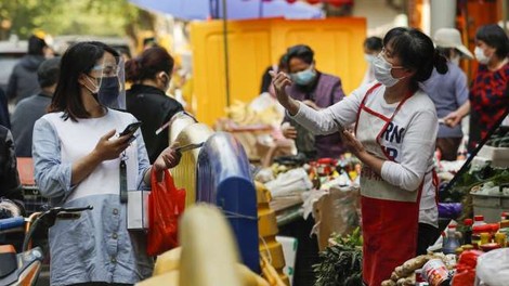 Misija WHO ob svojem obisku na Kitajskem ni uspela identificirati živalskega izvora novega koronavirusa