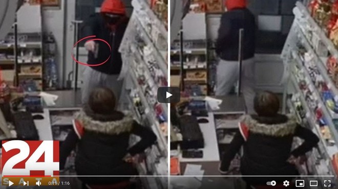 VIDEO: Zamaskiran vstopil v trgovino, zahteval denar, prodajalka pa z roko v bok: "Ne dam!" (foto: Youtube)