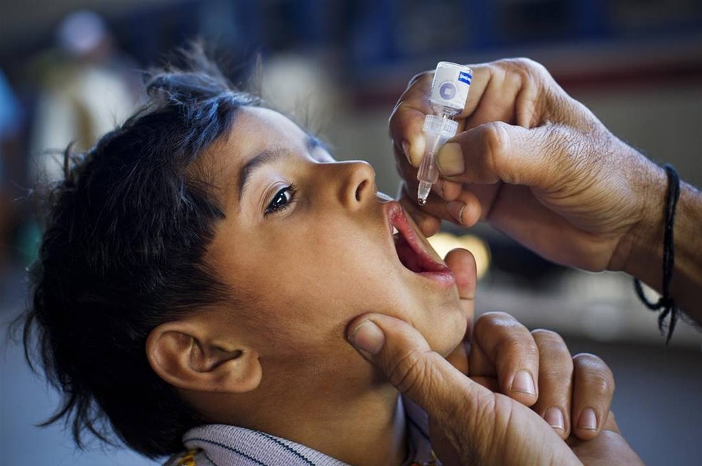 UNICEF: S cepljenjem vsakih 12 sekund rešimo 1 otroško življenje! (foto: UNICEF/Zaidi)