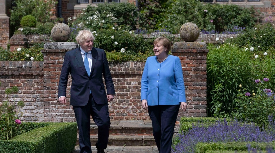 Angela Merkel britanskemu premierju napovedala lažje pogoje za vstop Britancev v Nemčijo (foto: profimedia)