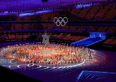 Olimpijski ogenj v Pekingu je ugasnil, zastavo s petimi krogi prevzeli Italijani