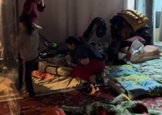 FOTO in VIDEO: 18 ljudi spi v isti sobi - v takšnih razmerah živijo Ukrajinci!