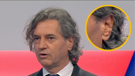 Kako se je Robert Golob odzval na očitke, da je imel v ušesu slušalko?