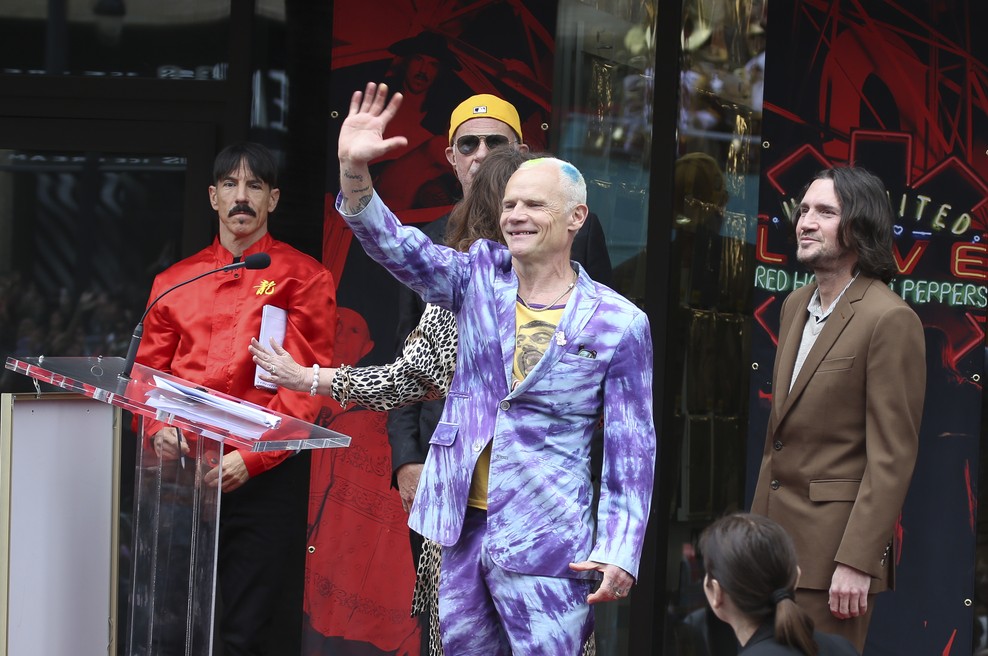 Skupina Red Hot Chili Peppers na prireditvi ob razkritju svoje zvezde na Pločniku slavnih. (foto: Profimedia)