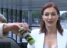 VIDEO: Incident med poročanjem v živo! Stopil je pred novinarko, polival pijačo in postregel z močnimi kletvicami
