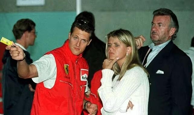 Michael in njegova žena Corinna z Willijem Weberjem leta 1996. Weber je bil Michaelov menedžer vse do leta 2012.