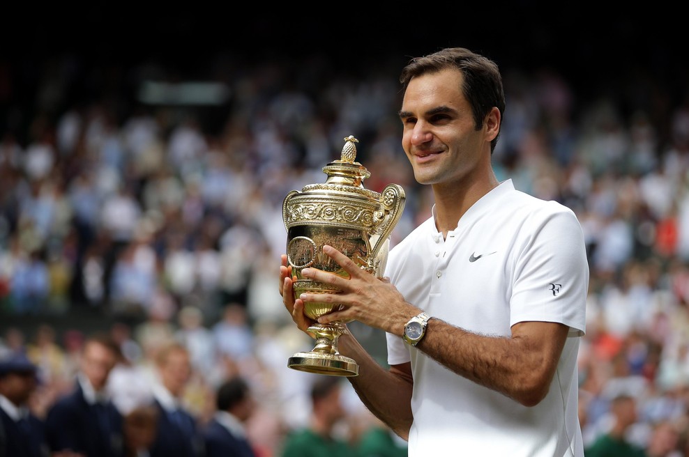 FOTO: Federer v mlajših letih oboževal Jordana, na vrata otroške sobe pa nalepil plakat prsate zvezdnice (foto: Profimedia)