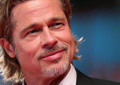 Brad Pitt se ne skriva: na koncertu je užival s sveže ločeno zvezdnico (FOTO)