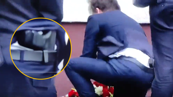 Javnost ogorčena: veter razkril, da minister za pasom nosi pištolo (VIDEO) (foto: Twitter/P@weł/posnetek zaslona/fotomontaža)