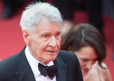 Harrison Ford v Cannesu ni mogel odmakniti pogleda s svoje mlade žene (FOTO)