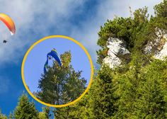 Nemška turista v Tolminu z jadralnim padalom pristala na ... drevesu (poglejte, kako sta se rešila)