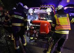 FOTO in VIDEO: Obilne padavine že povzročajo škodo (poplavilo je več stanovanjskih objektov in šolo)