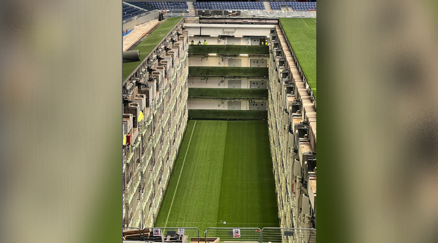 Kam je izginila nogometna zelenica? Na mestu, kjer bi moralo biti igrišče madridskega Reala, zeva velika luknja. (foto: Instagram/themadridviews)