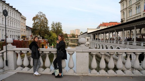 Ljubljana Tromostovje turistki