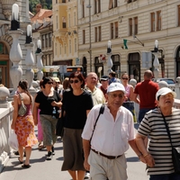 Ljubljana turisti Tromostovje