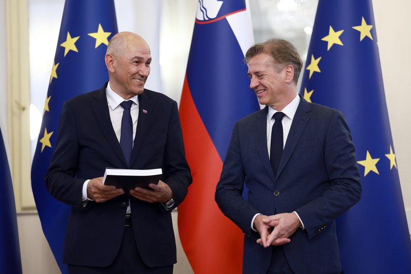 janez jansa robert golob vlada prevzem oblasti premier slovenija parlament besede izziv