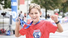 
                                                         Med prvo dvajseterico tekačev na 5 kilometrov je bil tudi 13-letni Simon iz Grosuplja
