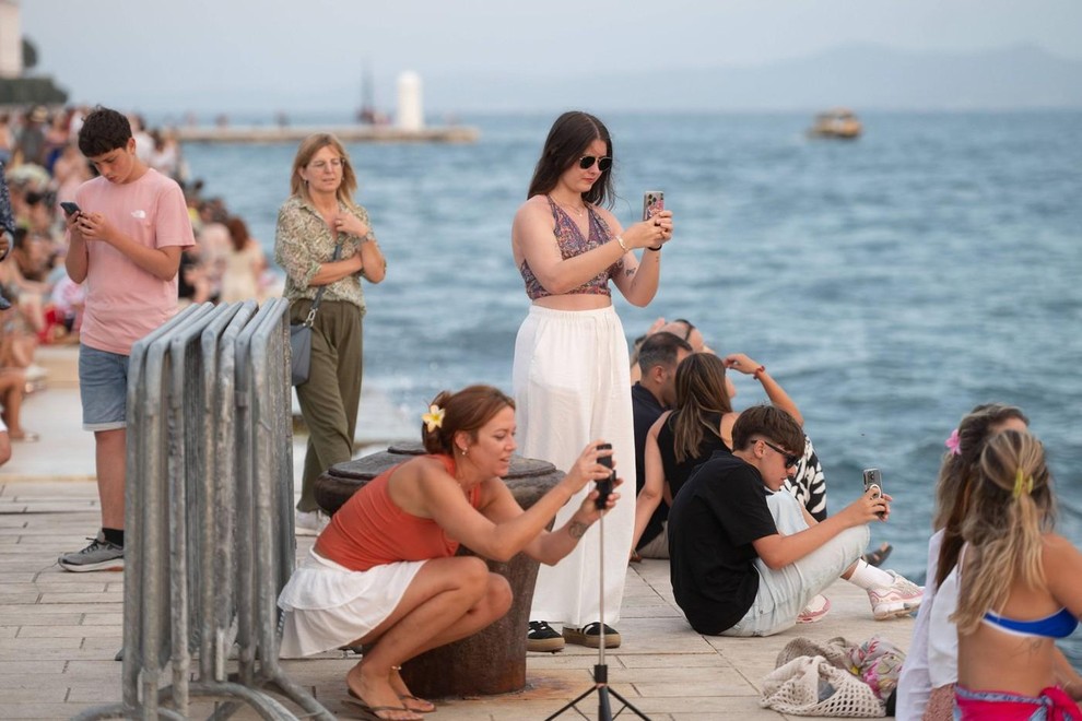 Zadar turisti soncni zahod